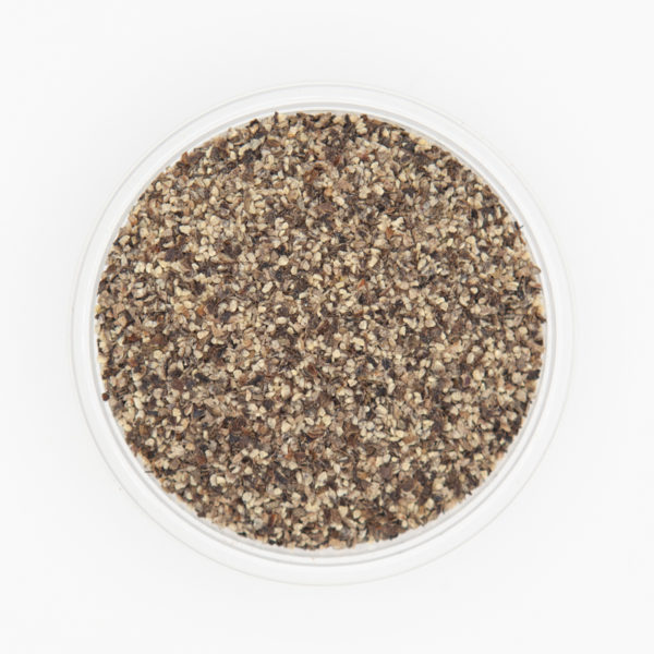 25 Mesh Ground Pepper Closeup Shot From Top Down In A Dish On White Background