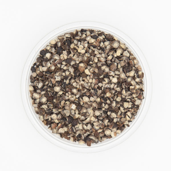 Closeup of Black Pepper Butcher Grind in dish on white background